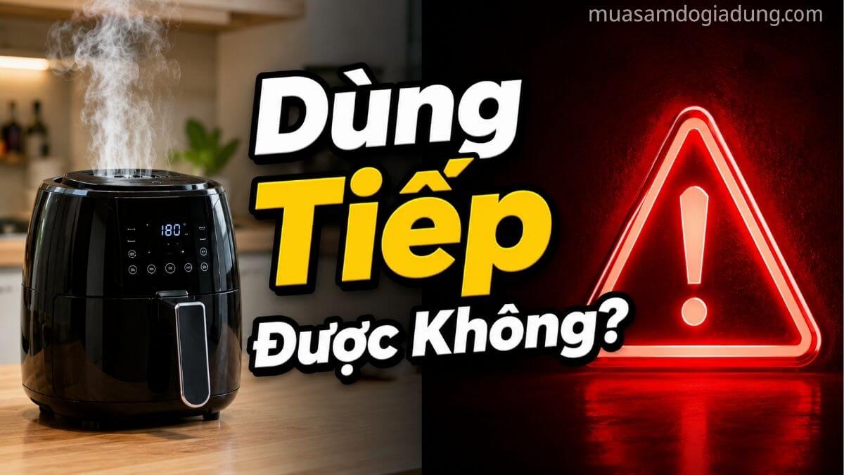 Nồi chiên không dầu bốc khói và biểu tượng cảnh báo có nên tiếp tục sử dụng